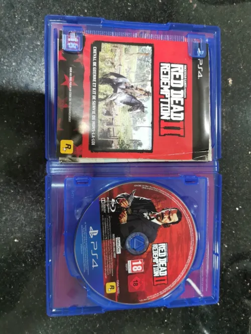 Ps4 slim 500gb avec 3 jeux Rdr +Gta5 +Nfs payback 