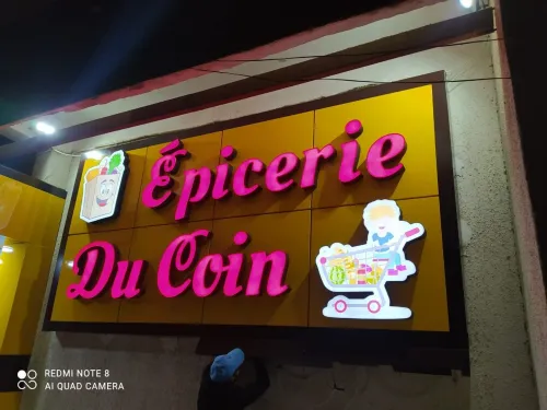 Revetement des Vitrines et Enseignes Publicitaires - Conception & Réalisation