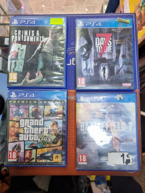 PlayStation 4 Slim 500gb avec manette Original et 4 jeux