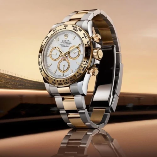 Montre Rolex Daytona gold silver