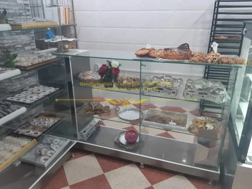 Vitrine et présentoir d'exposition en verre 
