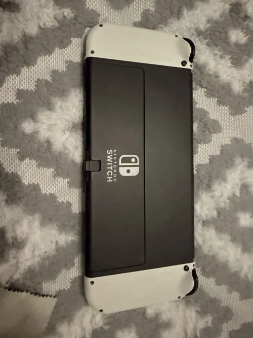 Nintendo Switch Oled + protection écran Non flashé
